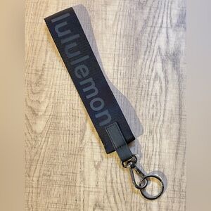 Lululemon wrist strap keychain.